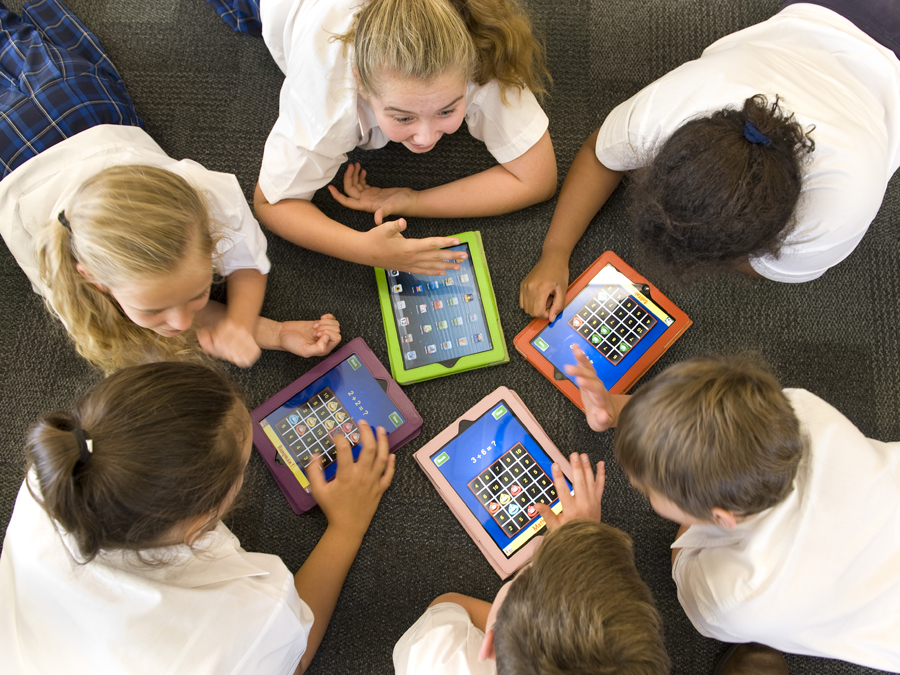 Children on iPads